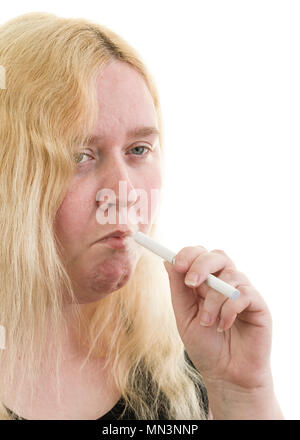 Young caucasian blonde female woman using smoking an electronic cigarette isolated on white background  Model Release: Yes. Property Release: No. Stock Photo