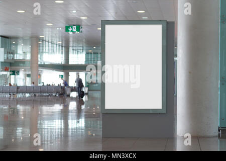 Blank billboard mock up in an airport, with unfocused background Stock Photo