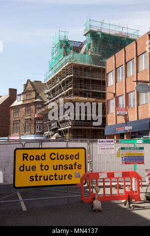 Central Plaza Hotel, Victoria Viaduct, Carlisle, Cumbria, UK. 14th, May, 2018. Main road Victoria Viaduct into the city centre of Carlisle, has been closed for almost two weeks over concerns about the safety of the derelict Central Plaza Hotel building from the dangers posed by seven tonnes of masonry at risk of falling. They are seeking the seeking the de-listing of the grade-II building to make it more attractive to developers. Credit: Andrew Findlay/Alamy Live News Stock Photo