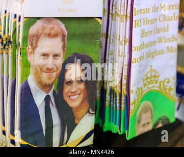 Central London, 14th May 2018. Who's doing the dishes? Harry & Meghan tea towels. Union Jack flags, decorations, gift mugs, bunting, commemorative plates and all kinds of Royal Wedding memorabilia and merchandise are on display as London gets ready for the Royal Wedding between Prince Harry and Meghan Markle on Saturday in Windsor. Credit: Imageplotter News and Sports/Alamy Live News Stock Photo