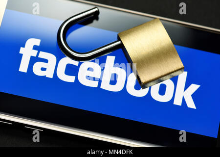 Open lock on Smartphone with facebook logo, Data scandal, Offenes Schloss auf Smartphone mit Facebook-Logo, Datenskandal Stock Photo