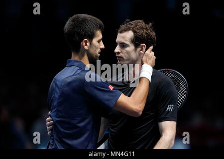 LONDON, ENGLAND - NOVEMBER 20: Andy Murray of Great Britain commiserates with Novak Djokovic of Serbia after winning the final of the singles tournament on Finals day eight of the ATP World Tour Finals at the O2 Arena on November 20, 2016 in London, England. Stock Photo