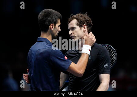 LONDON, ENGLAND - NOVEMBER 20: Andy Murray of Great Britain commiserates with Novak Djokovic of Serbia after winning the final of the singles tournament on Finals day eight of the ATP World Tour Finals at the O2 Arena on November 20, 2016 in London, England. Stock Photo
