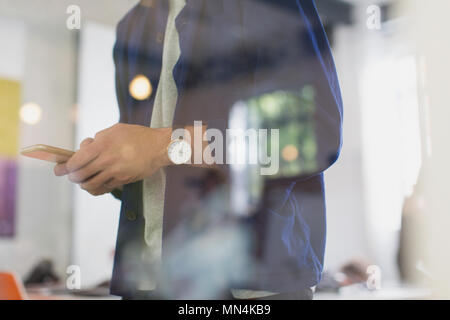 Businessman texting with smart phone Stock Photo