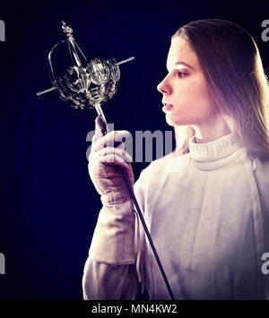 Fencing sport for women epee fencer. Stock Photo