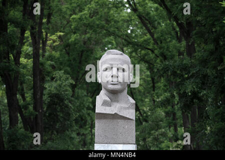 Statue of Yuri Alekseyevich Gagarin who was a Soviet pilot and cosmonaut and the first human to journey into outer space placed in Gagarin boulevard in the center of Tiraspol the capital and administrative centre of the internationally recognized borders of Moldova under de facto control of the unrecognized Pridnestrovian Moldavian Republic also called Transnistria (PMR) since 1992. Stock Photo