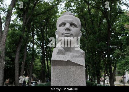 Statue of Yuri Alekseyevich Gagarin who was a Soviet pilot and cosmonaut and the first human to journey into outer space placed in Gagarin boulevard in the center of Tiraspol the capital and administrative centre of the internationally recognized borders of Moldova under de facto control of the unrecognized Pridnestrovian Moldavian Republic also called Transnistria (PMR) since 1992. Stock Photo