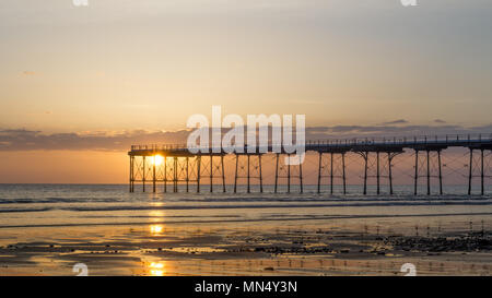 Saltburn pier at sunrise. Saltburn is a seaside town located in the north east of the UK. Stock Photo