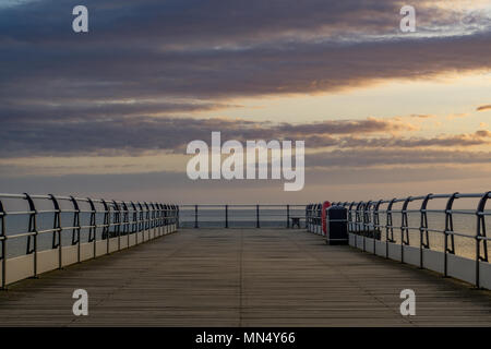 Saltburn pier at sunrise. Saltburn is a seaside town located in the north east of the UK. Stock Photo