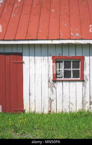 Old house with red door, red roof, one window, peeling white wash paint, taken at the 3rd Battlefield of Winchester (Fort Collier).  Composite ready. Stock Photo