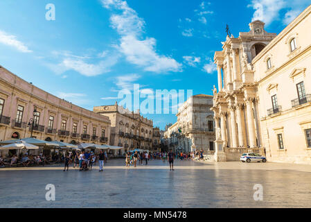 Siracusa, Italy - August 17, 2017: Piazza Duomo and the cathedral with police patrol and people around in the old town of Siracusa, Sicily, Italy Stock Photo