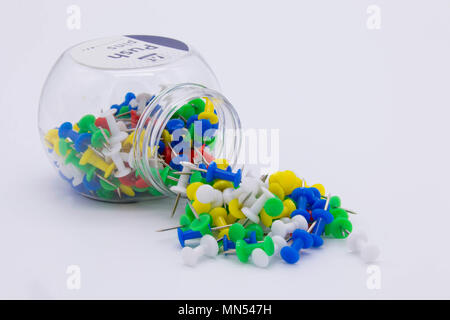 Pile of plastic notice board push pins on a white background Stock Photo