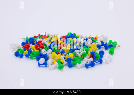 Pile of plastic notice board push pins on a white background Stock Photo