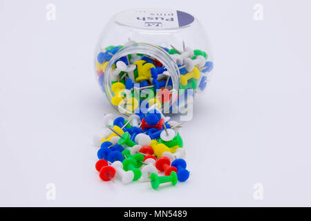 Pile of plastic notice board push pins on a white background Stock Photo