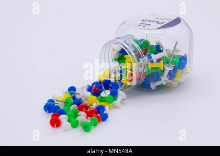 Pile of plastic notice board push pins on a white background Stock Photo