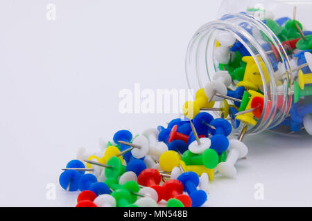 Pile of plastic notice board push pins on a white background Stock Photo