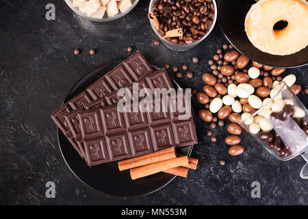 Tasty and sweet candies on wooden background Stock Photo