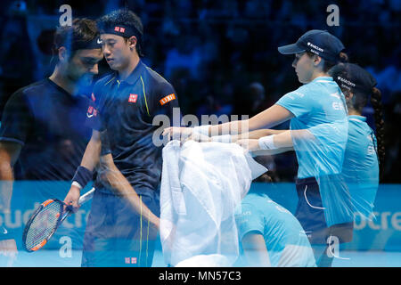 Roger Federer vs Kei Nishikori (Editors note, in camera multiple exposure) during Day 4 of the 2015 Barclays ATP World Tour Finals - O2 Arena London England. 19 November 2015 Stock Photo