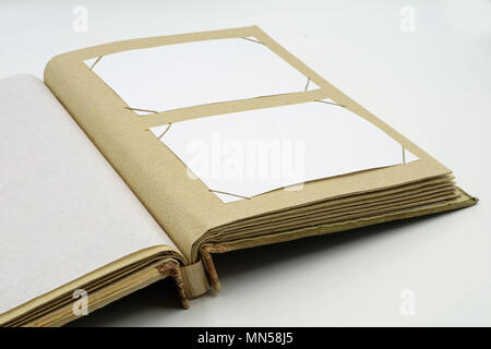 open diary or photo album book on white background Stock Photo