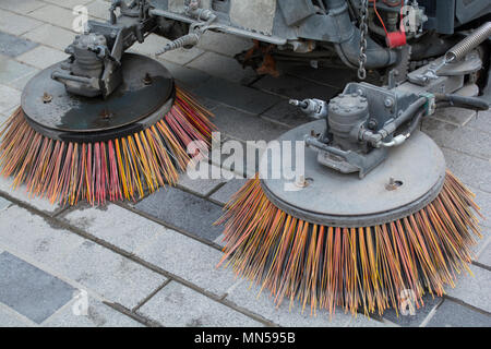 Brushs of street cleaning machine on street Stock Photo