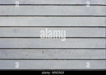 old weathered gray color painted wooden wall background texture Stock Photo