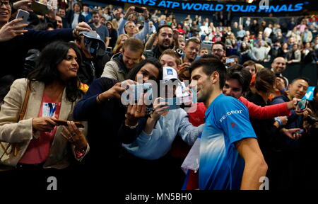 Novak Djokovic signs autographs during Day 4 of the 2015 Barclays ATP World Tour Finals - O2 Arena London England. 19 November 2015 Stock Photo