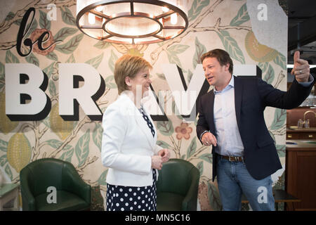 Jamie Oliver meeting First Minister Nicola Sturgeon at Benwell House in London where she announced new childhood obesity initiatives. Stock Photo