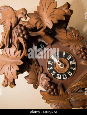 Face of Cuckoo Clock close up. Stock Photo