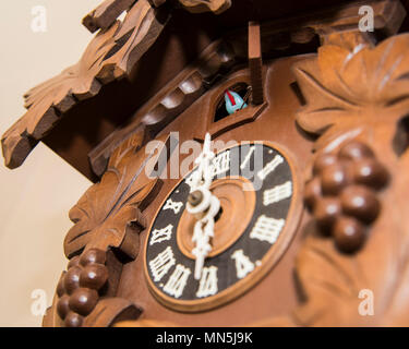 Face of Cuckoo Clock close up. Stock Photo