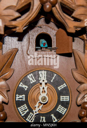 Face of Cuckoo Clock close up. Stock Photo