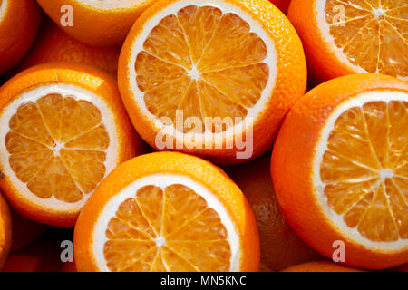 Colorful fruit pattern of fresh orange slices. From top view Stock Photo