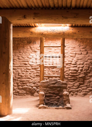 Underground Kiva with access ladder in a Native American Pueblo in New Mexico, USA. Stock Photo