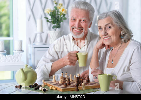 Senior couple playing chess Stock Photo