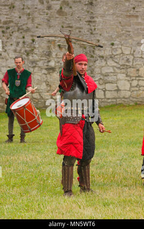 Crossbow man. Show by members of The Knightly Order of St. George of Visegrad (Hungary). 'Knight's Tournament with Plum'. Szydlow, Poland. Stock Photo