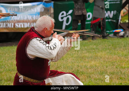 Crossbow man. Show by members of The Knightly Order of St. George of Visegrad (Hungary). 'Knight's Tournament with Plum'. Szydlow, Poland. Stock Photo