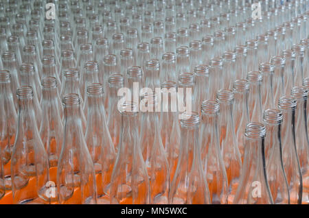 Many empty translucent bottles in a row are perspective Stock Photo