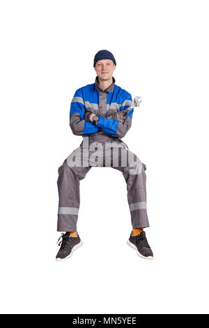 Builder, installer of ventilation with tools in hands. Stock Photo