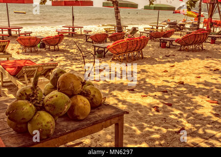 cocos sun sand and turquoise sea on the ochheuteal tourist beach near the city of Sihanoukville. Cambodia Stock Photo