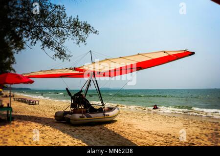 small small plane boat in the golden sands of the ochheuteal beach near the city of Sihanoukville. Cambodia Stock Photo