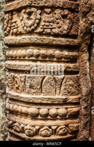 Stone carved poles of Vat Phou religious complex in Champasak province, Laos Stock Photo