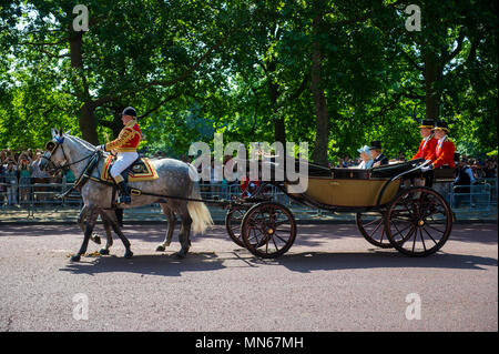 LONDON, UK - JUNE 17, 2017: Her Majesty Queen Elizabeth II and Duke of Edinburgh travel by horse drawn carriage during the Trooping the Colour parade. Stock Photo