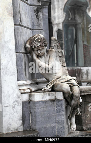 statue of a sleeping boy angel at La Recoleta cemetery Buenos Aires, Argentina. Stock Photo