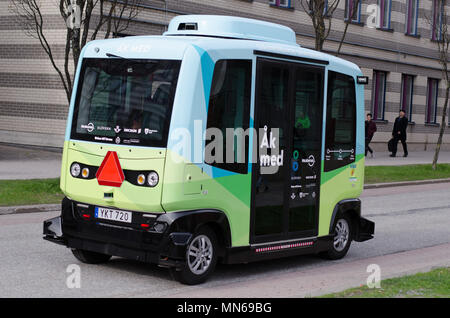 Stockholm, Sweden - 4 may 2018. A Self-driving bus on the straight street between Scandic Victoria hotel and the mall Kista Galleria in the northern S Stock Photo