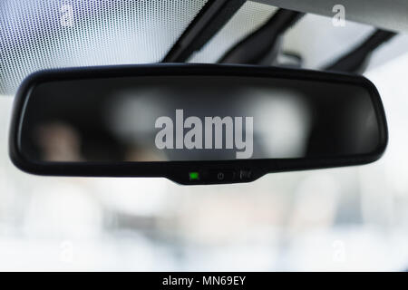 Car mirror with adaptive dimming system, auto brightness control Stock Photo