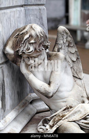 statue of a sleeping boy angel at La Recoleta cemetery Buenos Aires, Argentina. Stock Photo