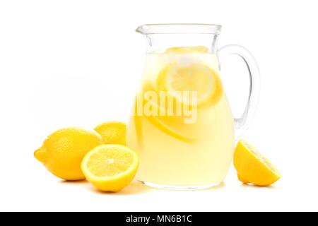 Pitcher of lemonade with lemons isolated on a white background Stock Photo