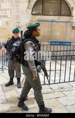 12 May 2018 Young Israeli policeman and woman  on duty in the Via Dolorosa just before the 70 year Independence celebrations. Stock Photo