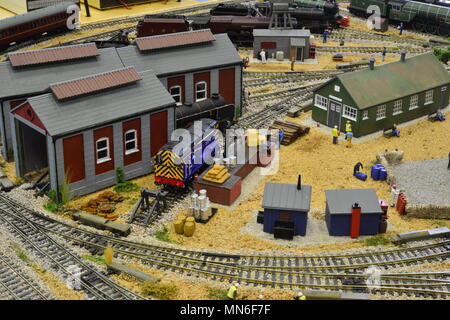 A model railway shunting yard set on a desert landscape Stock Photo
