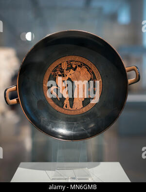 Berlin. Germany. Altes Museum. Drinking Cup of Makron: The Cult of Dionysus, Dionysus and a satyr face each other. Attic red-figure Cup / Kylix made b Stock Photo
