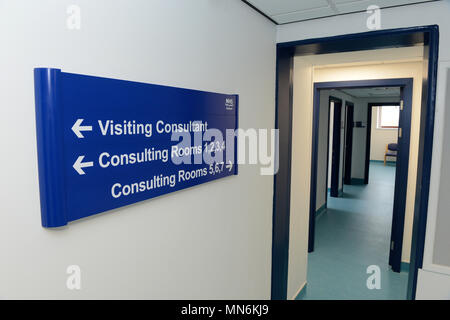 Inside a deserted NHS waiting room and doctors surgery Stock Photo